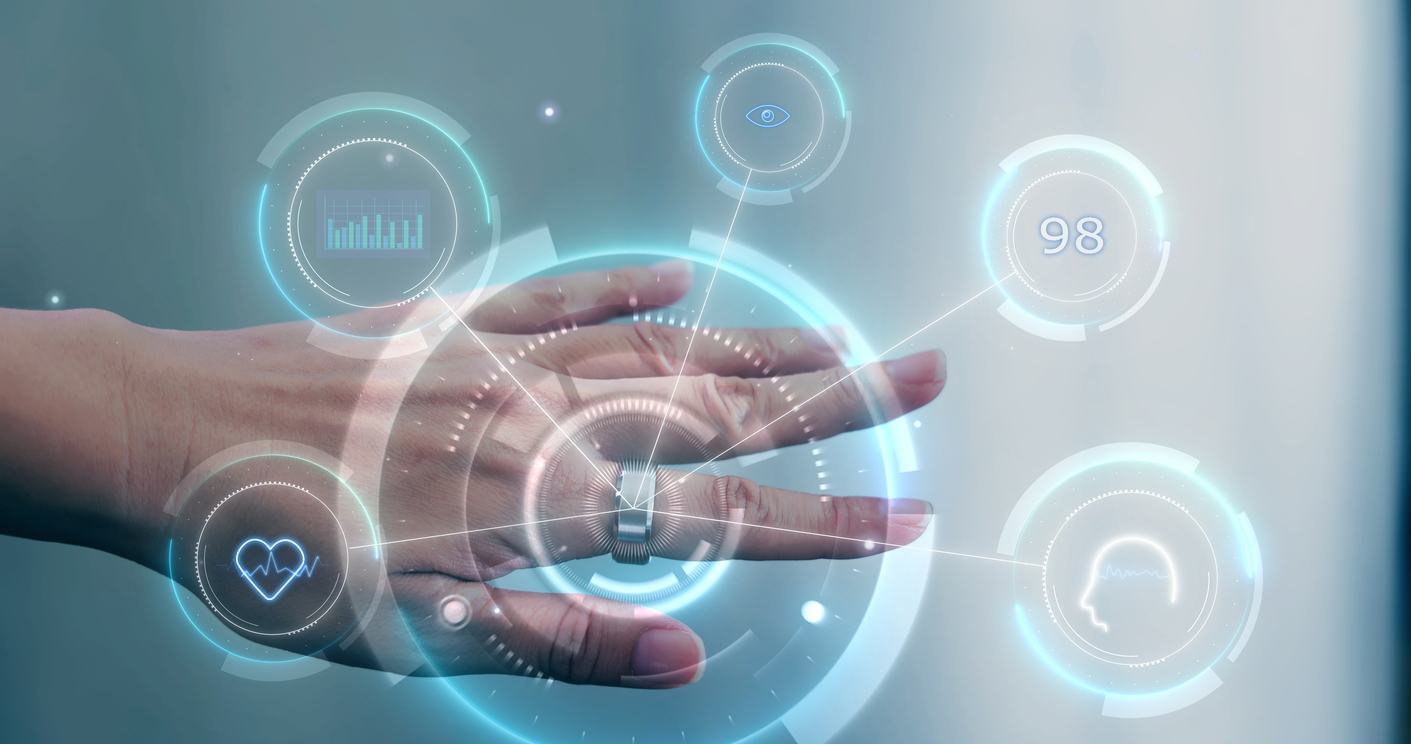 Hand wearing smart ring displaying holographic health and activity data for wellness monitoring.